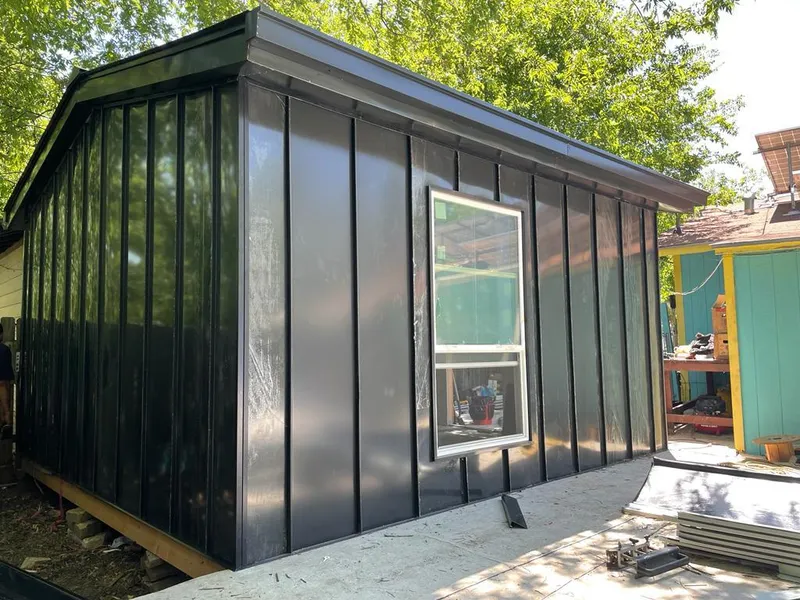 Black standing seam metal wall panels for Roof Inspection in White Bear Lake