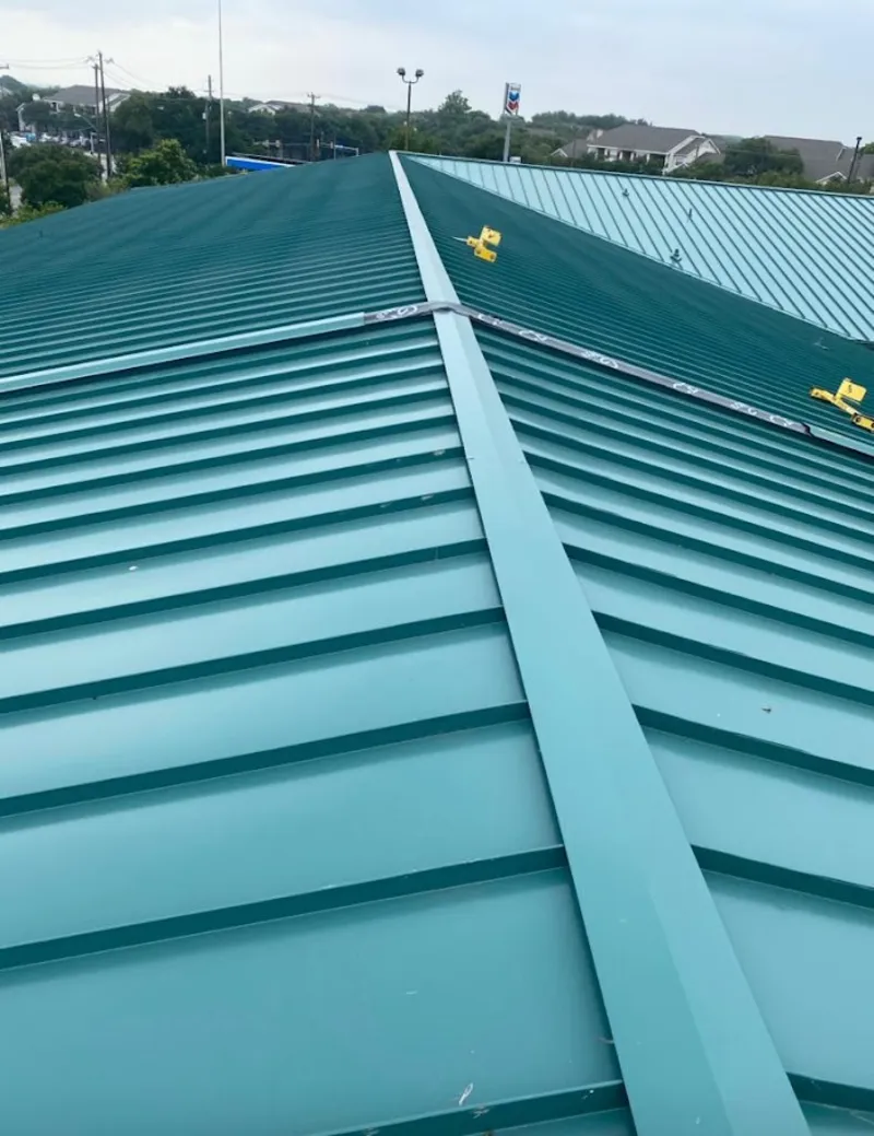 Green commercial metal roof ridge and valley for Metal Roof Repair in White Bear Lake