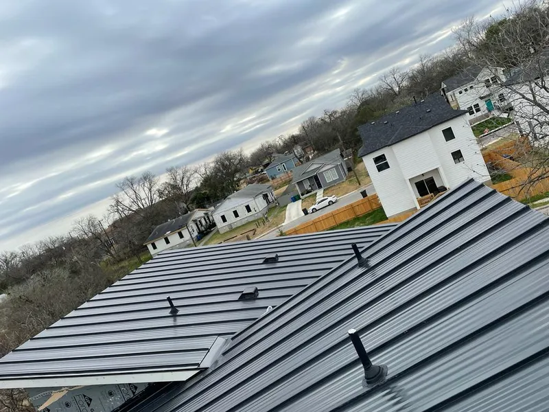 Standing seam metal roof panels with vents for Skylight Repair in White Bear Lake